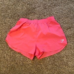 Pink gymshark loose training shorts womens